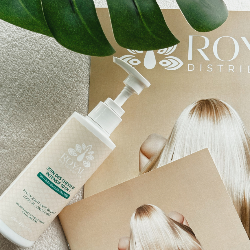 ROYAL 10-in-1 Intensive Hair Treatment styled alongside ROYAL branded imagery and tropical greenery.