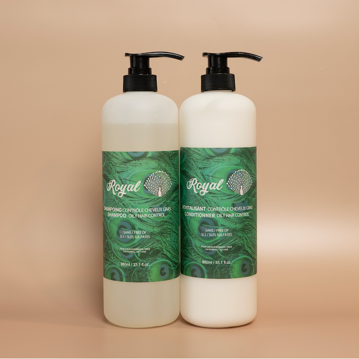 ROYAL Balance Shampoo and Balance Conditioner 980 ml bottles displayed together against a beige background.