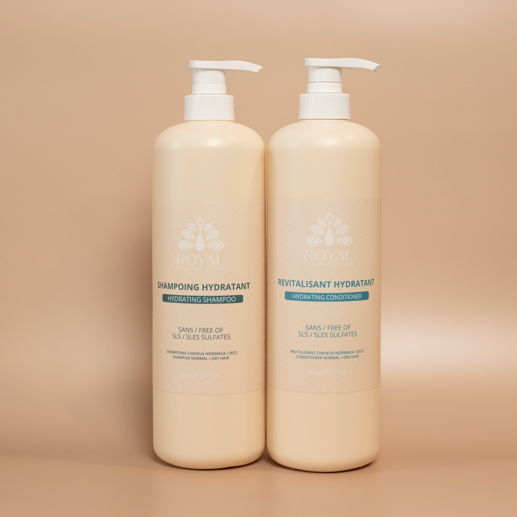 ROYAL Hydrating Shampoo and Hydrating Conditioner 980 ml bottles displayed together against a beige background.