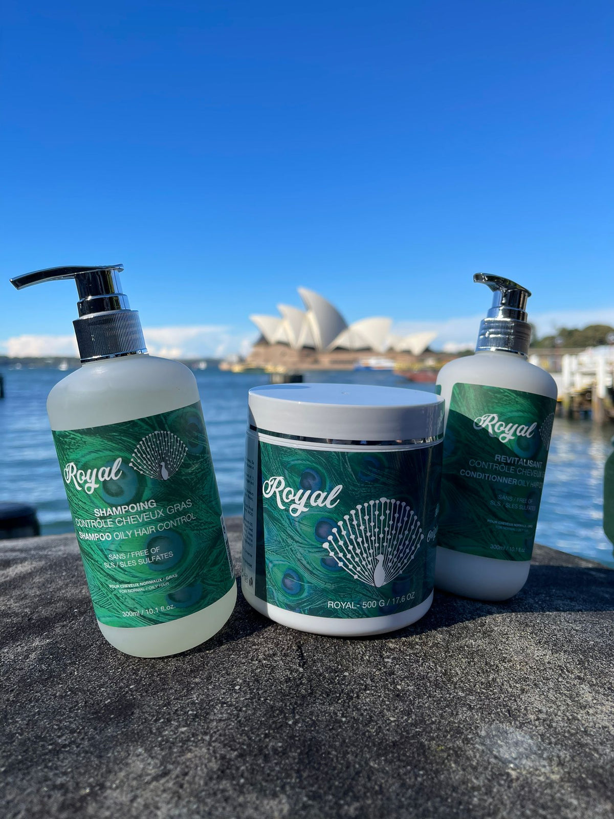 ROYAL Oil Control Shampoo, Conditioner and hair mask displayed outdoors with the Sydney Opera House in the background.