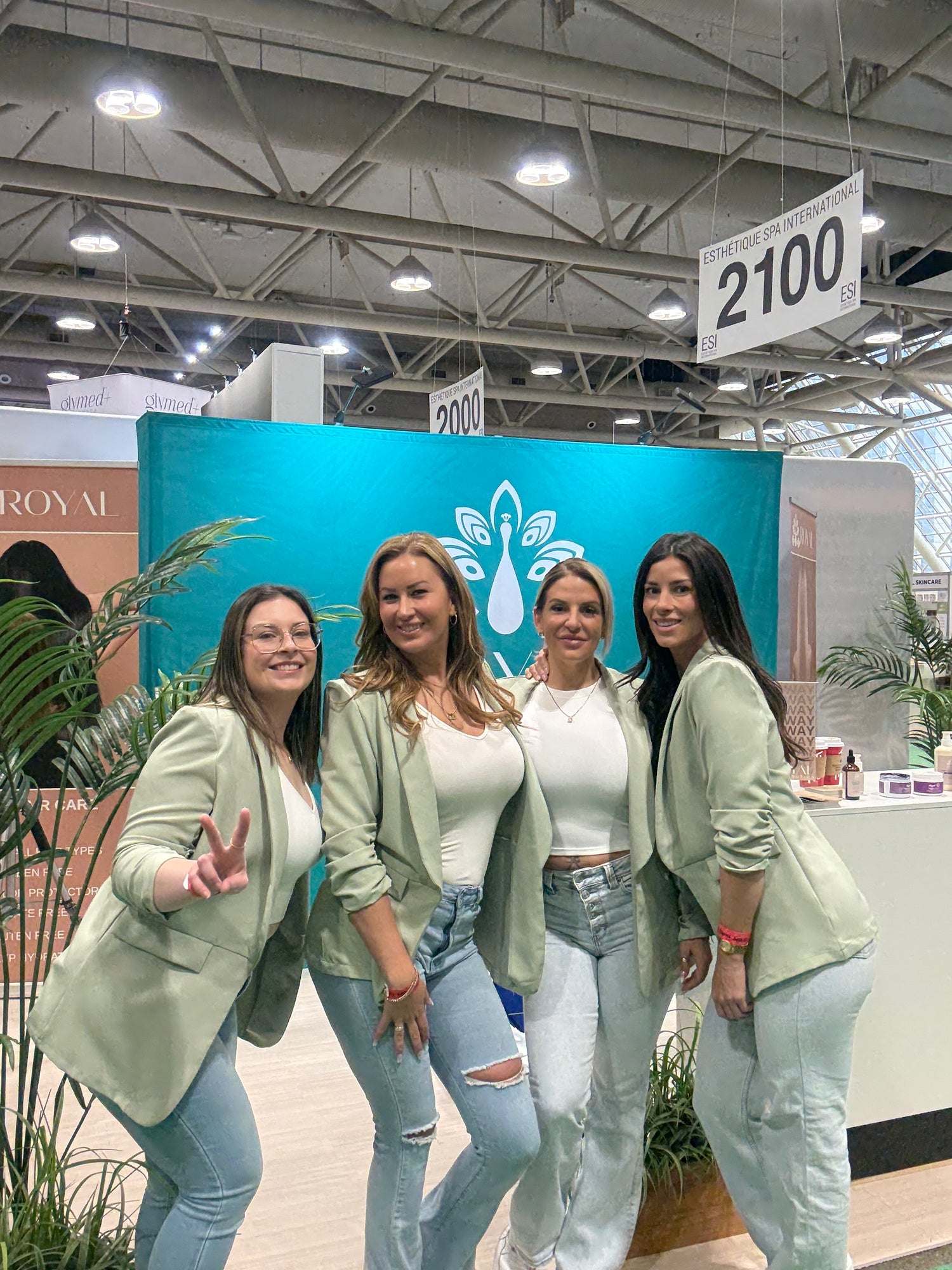ROYAL team members at the ROYAL booth during the ESI Toronto beauty industry event.