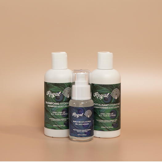 ROYAL travel-size hair care products displayed together against a beige background, without the travel case.